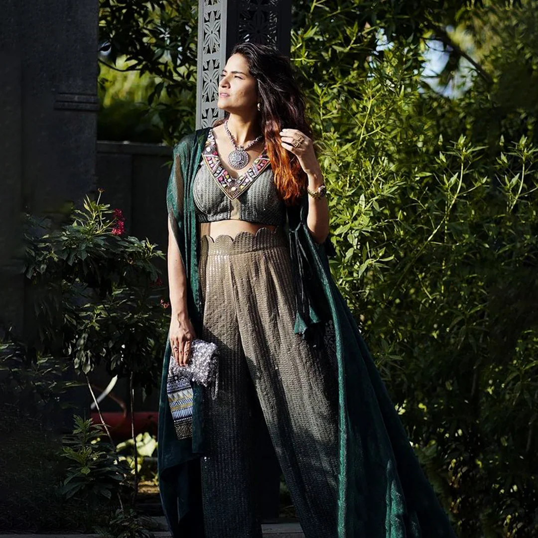 Ritu Rathee in emerald green cheap thrills cape set