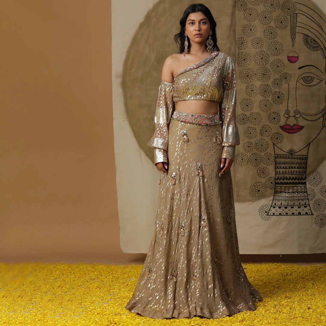 Golden one shoulder lehenga set